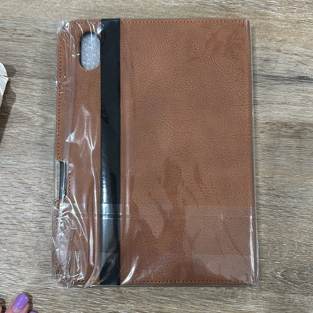 NWT iPad mini leather brown full enclosure case. See picture for iPad specs